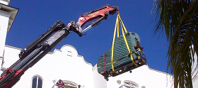 Déménagement de piano par la fenetre grue monte-charge palan ou nacelle